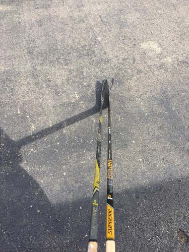2 Used Bauer 1s Sticks Left p92 95 and 102 flex