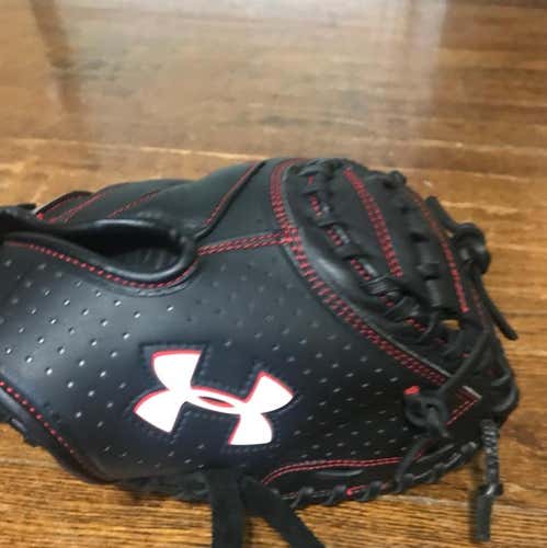 Under Armor catchers mitt/Willing to trade