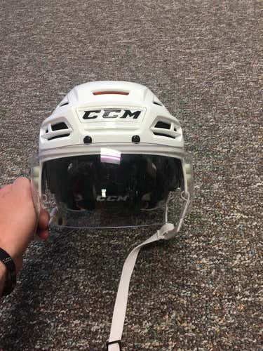 CCM Helmet Tack 710 helmet sz medium white. 90.00