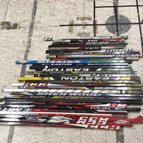 20 Assorted broken hockey sticks
