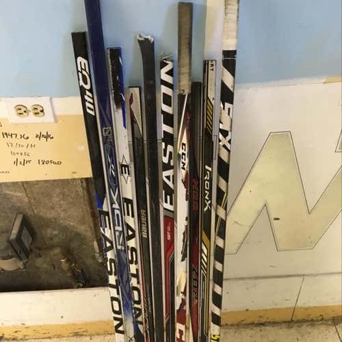 10 broken hockey stick shafts