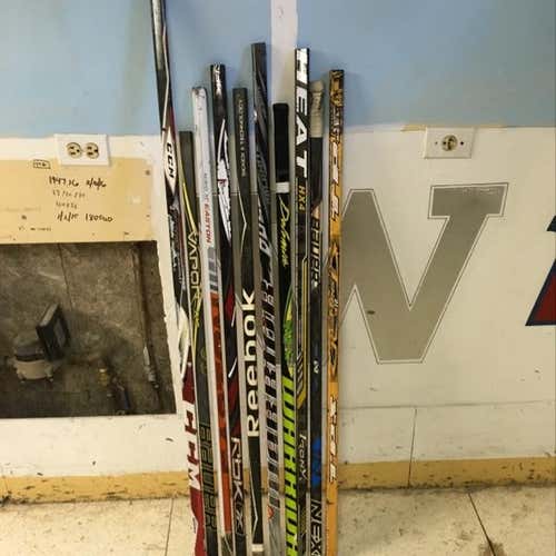 10 broken hockey stick shafts