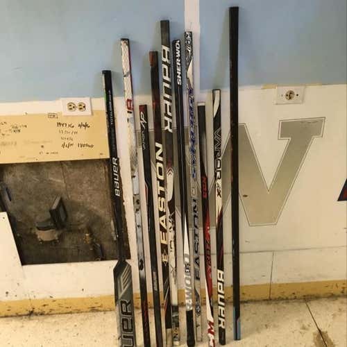10 broken hockey stick shafts