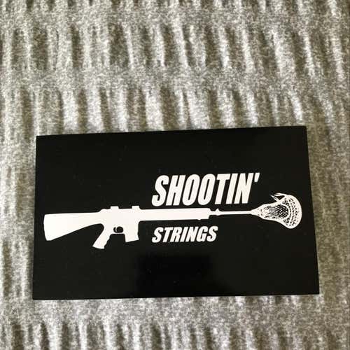 Shootin’ Strings Lacrosse Sticker
