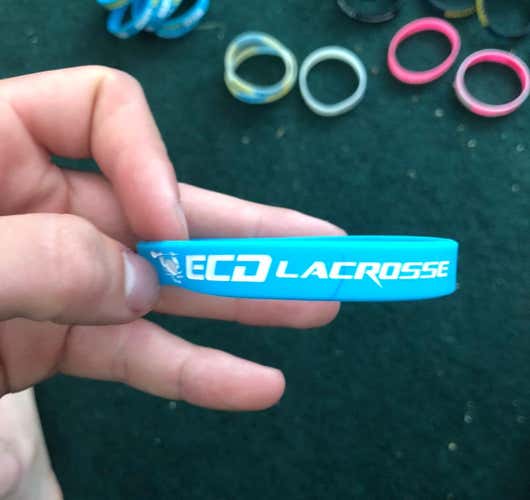2 Bracelets And An STX Lanyard