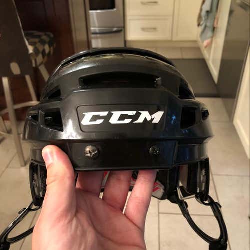 hockey helmet ccm vector, size large and color black.