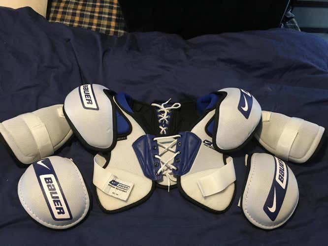 New Pro Defender Bauer Shoulder Pads