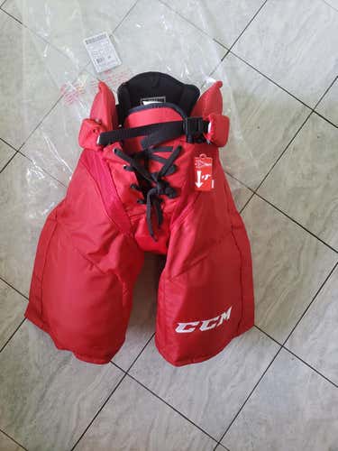 New pro stock CCM HP45 pants, large, Carolina Hurricanes
