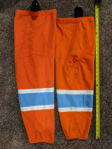 Mismatched Little Caesars hockey socks
