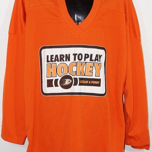 TRON HOCKEY ORANGE JERSEY JUNIOR L/XL - LEARN TO PLAY GETZLAF & PERRY STYLE #2