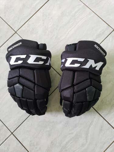 CCM HGTK Nathan MacKinnon game worn gloves, 14s