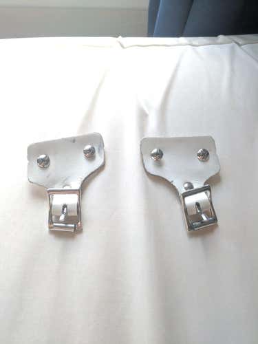 Goalie strap buckles