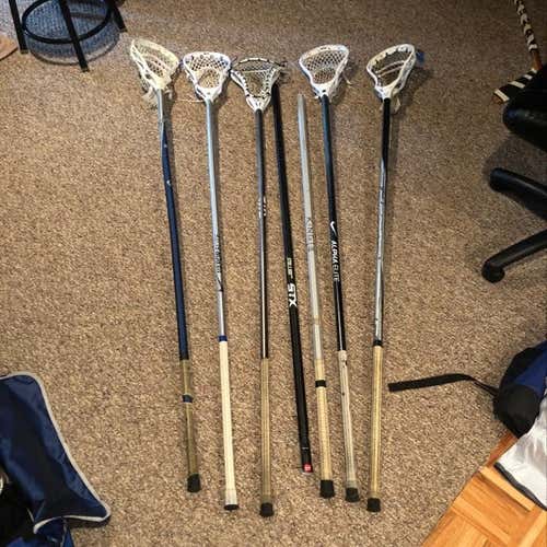 Assortment Of Nike, STX, Warrior Poles
