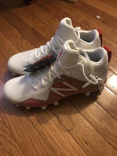 Brand new New Balance Freeze Cleats