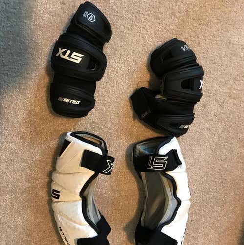 Stx Arm Guards Black (available) , Stx Arm Pads White(sold) Both XL