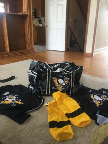 2 Practice Jerseys 1 Pair Of Yellow Penguins Socks and One Penguins Back