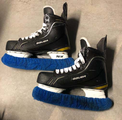 Lightly Used Bauer Supreme Total one Size 9 1/4 Hockey Skates