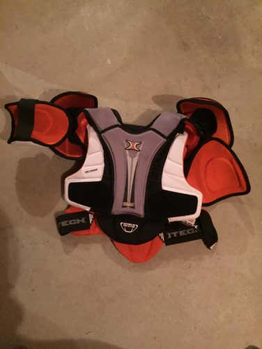 New Shoulder Pads Price Tag Still Attached