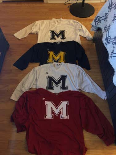 (7) “M” practice jerseys