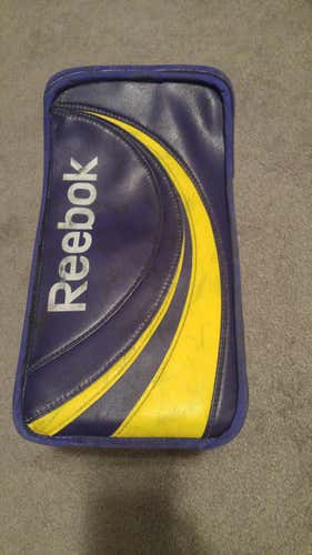 Purple and Yellow Reebok Premier II Pro Regular blocker used