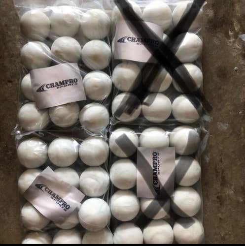 24 White lacrosse balls