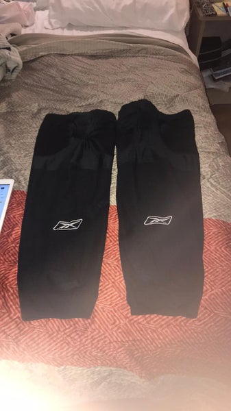 Used Pair Of Black Reebok Adult Sz. Hockey Socks