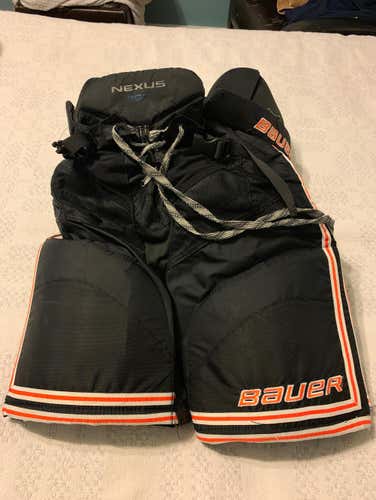 Used Bauer Nexus 800 Black And Orange Hockey Pants. Senior Small