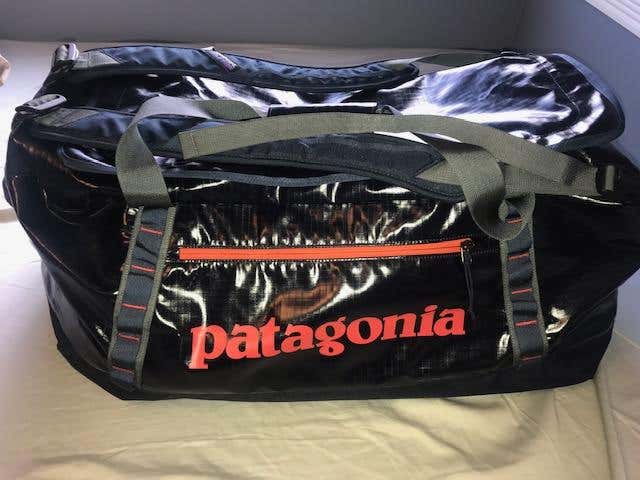 Patagonia black hole duffel. Navy blue/ orange