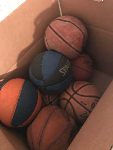 7 Used Basketballs