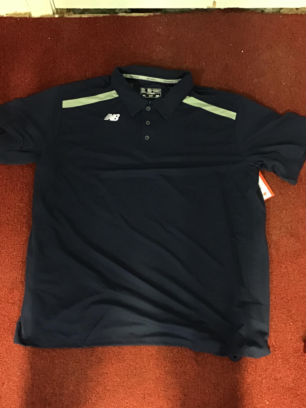 new balance golf shirt