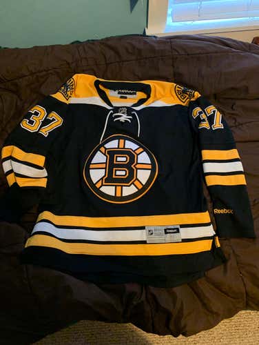 Adult Medium Replica Patrice Bergeron Boston Bruins Hockey Jersey