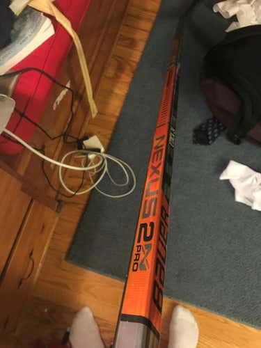 Extremely rare Bauer Nexus 2N Pro Stick Righty Senior Pro Stock from Utica College. Custom orange