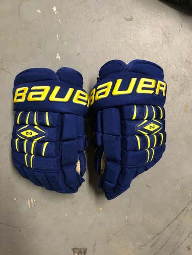 Blue And Yellow Bauer Nexus 1000 Gloves