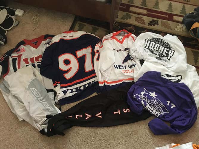 LARGE SELECTION OF HOCKEY JERSEYS AND PANTS