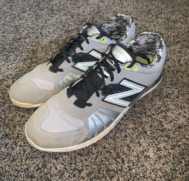 Men’s New Balance Metal Cleats