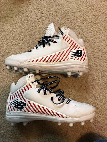 New Balance rush Cleats Size 5