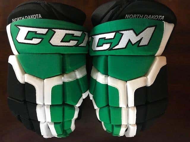 New! CCM HG50 NORTH DAKOTA Gloves Senior Pro Stock