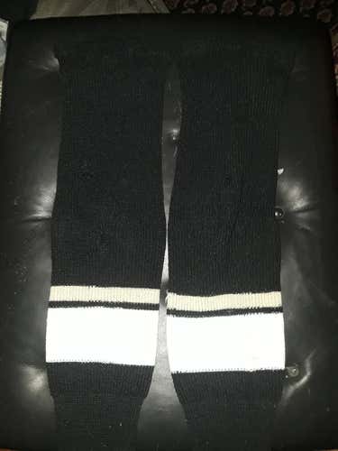 Black white and beige hockey socks