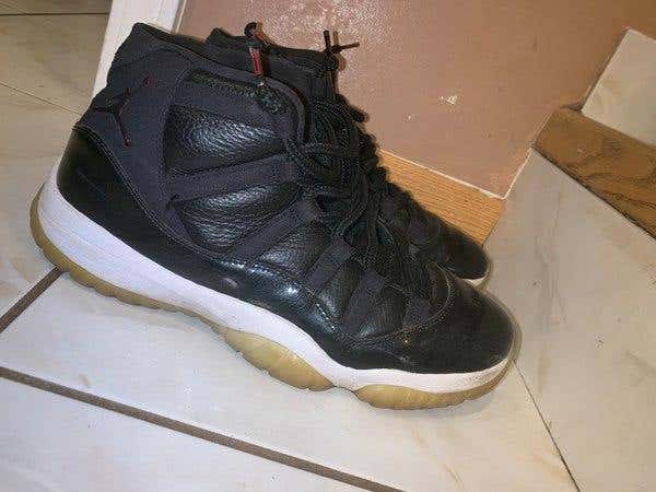 Pair Of Black Air Jordan 11'S