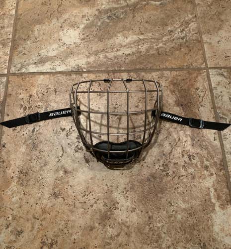 Lightly Used Bauer Re-Akt Titanium Cage Size Medium