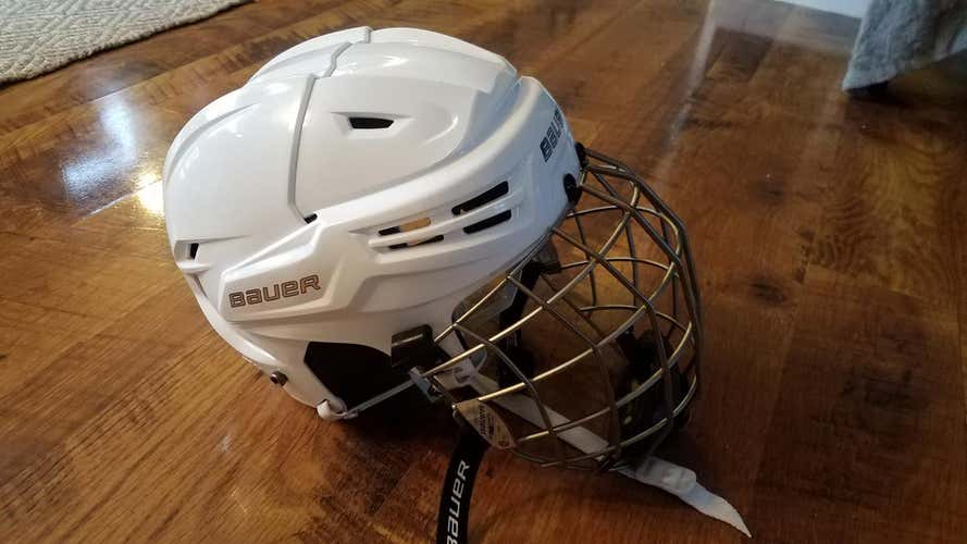 Bauer ReAkt Pro Stock helmet with titanium cage