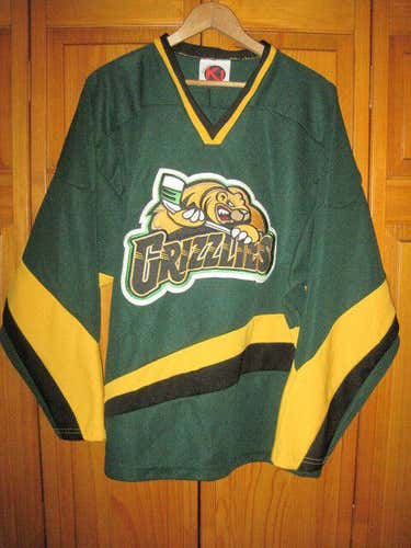 Minnesota Grizzlies AAA hockey jersey men's S green #7 SEWN junior