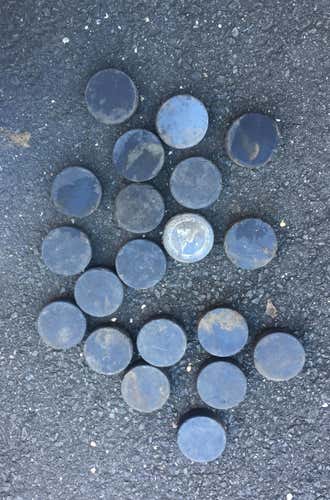 20 Used Pucks