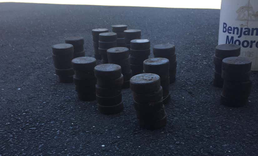 80 Used Hockey Pucks