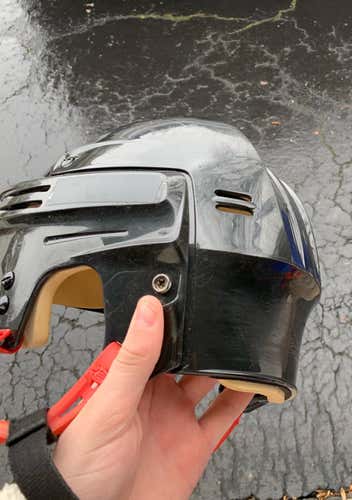 Bauer helmet with red ear loops