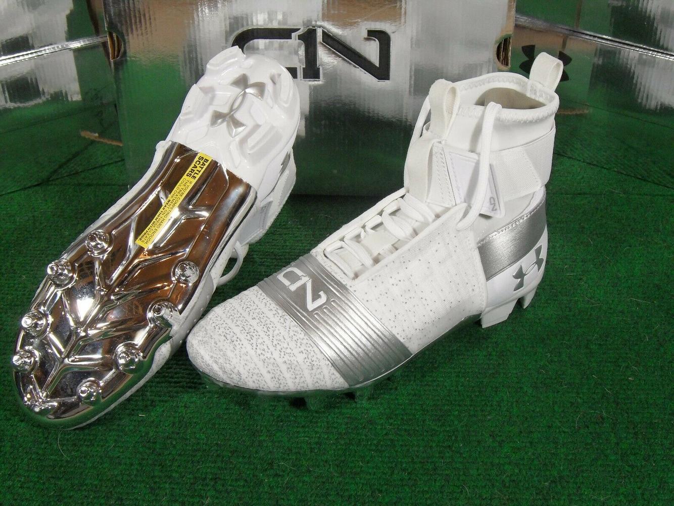 white and silver under armour cleats