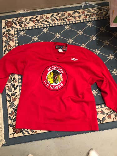 Red michigan ice hawks jersey. Large