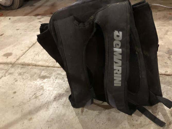 Demarini baseball backpack, holds two bats, gloves, cleats etc. Big pocket, great bag.