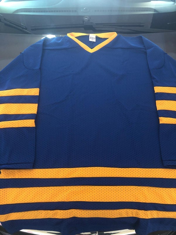 Sabres reveal blue and gold “goathead” Reverse Retro jersey