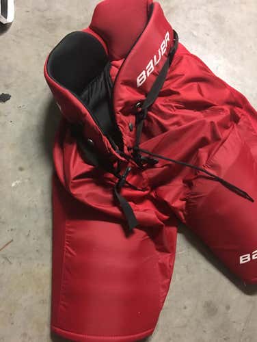 Red Bauer X60 Hockey Pants